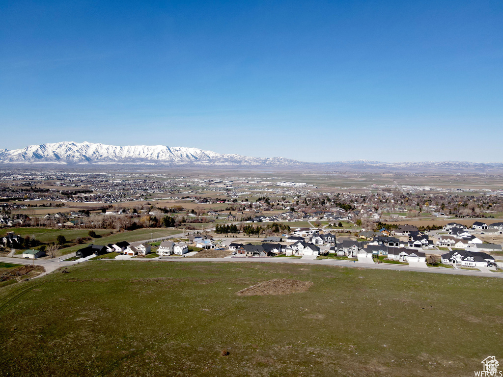 Aerial view of residential area with mountains