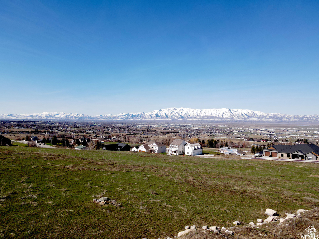 View of mountain backdrop with nearby suburban area