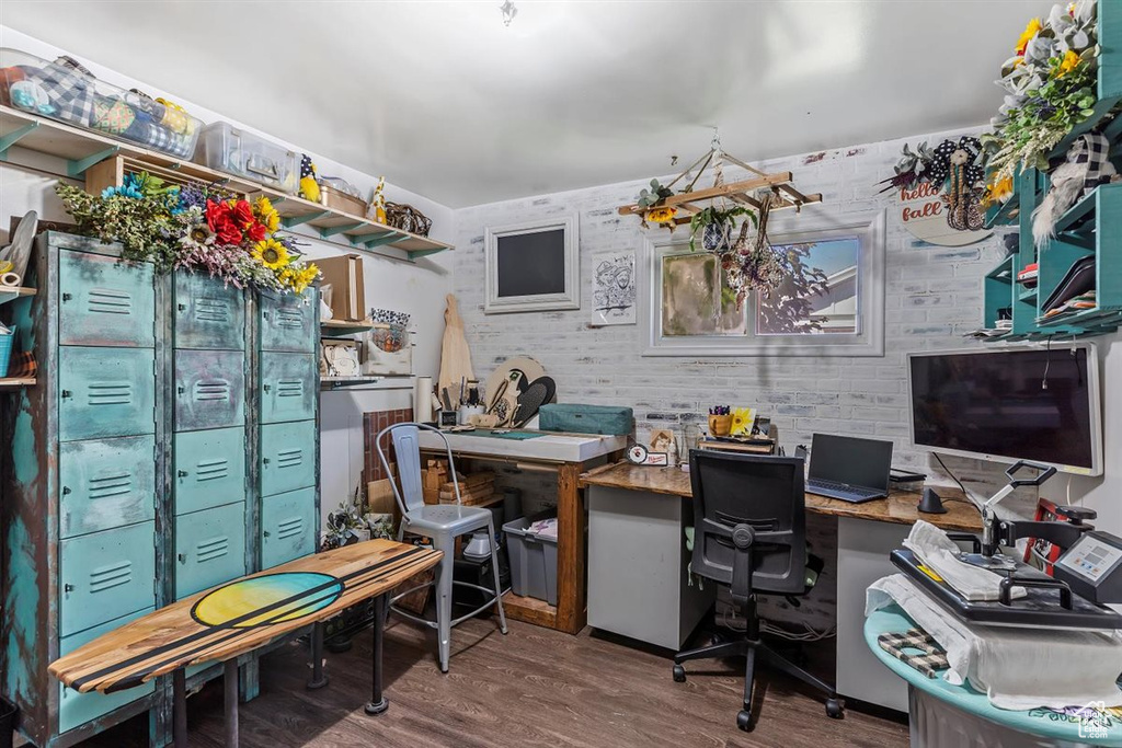 Home office featuring wood finished floors