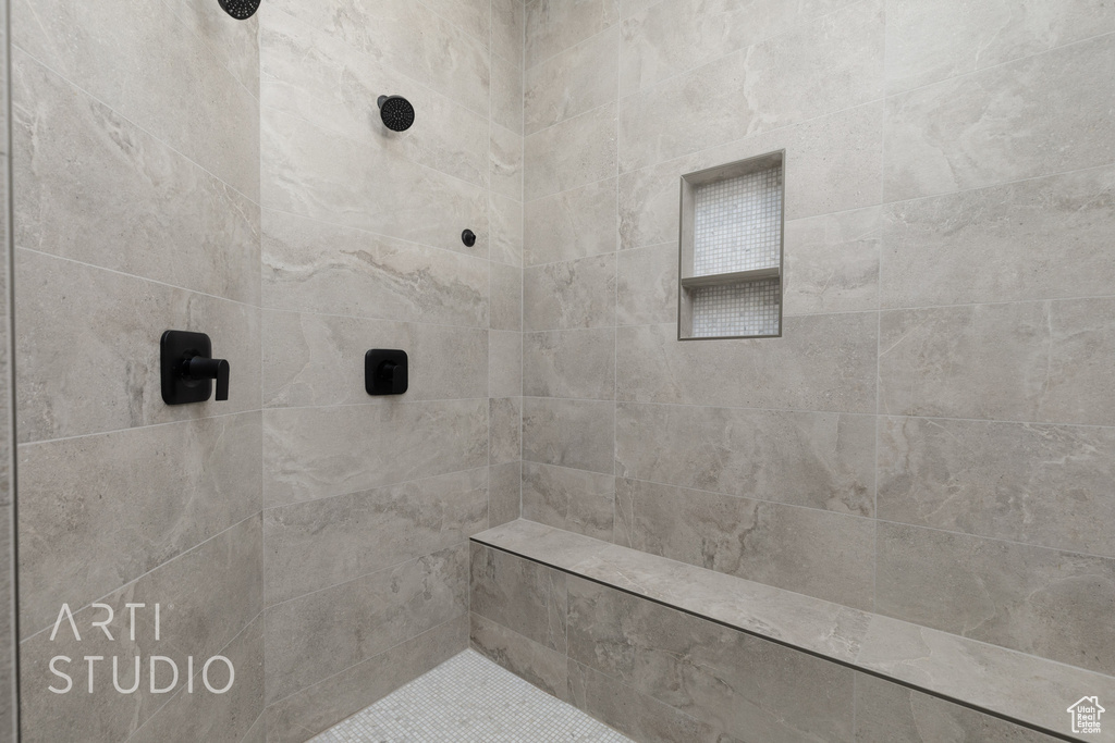 Bathroom featuring tiled shower