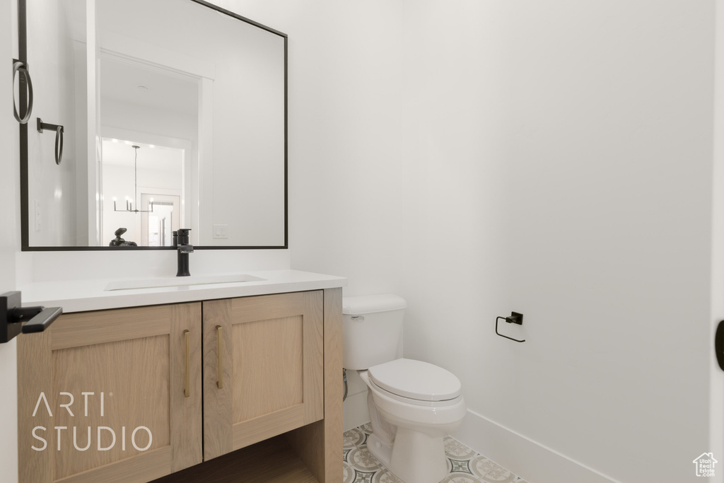 Bathroom with vanity and tile patterned floors