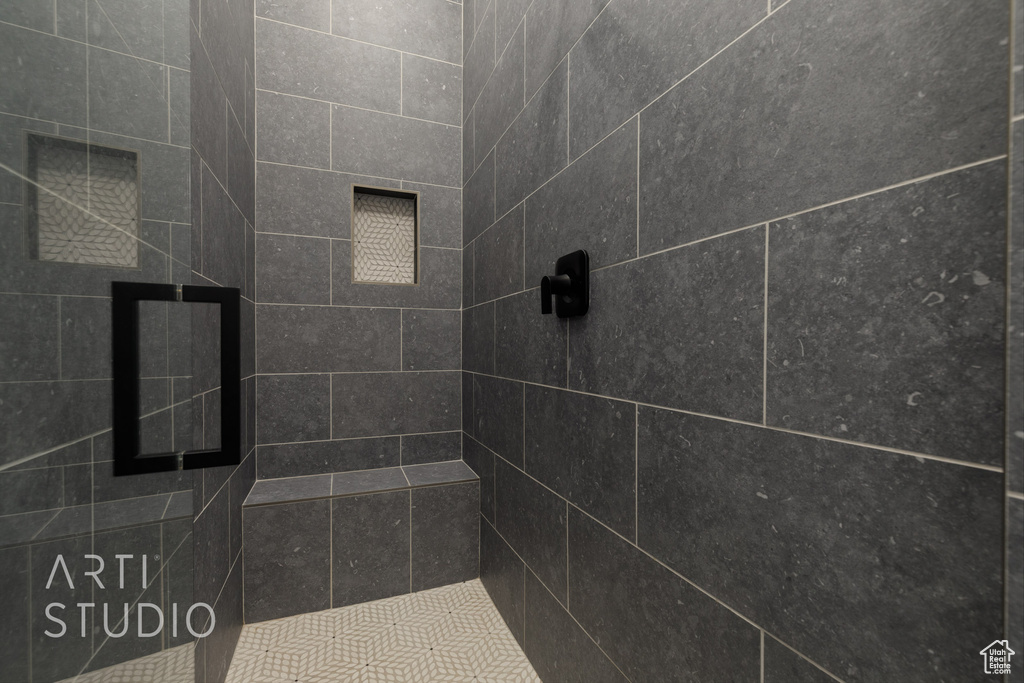 Full bathroom with tiled shower