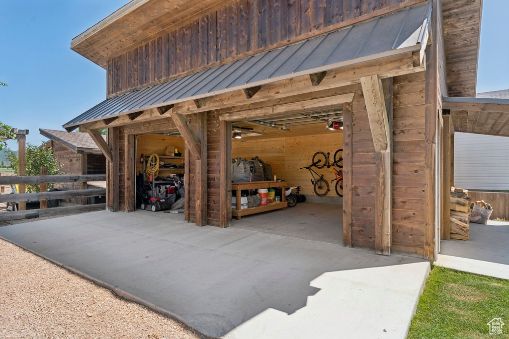 Garage with concrete driveway