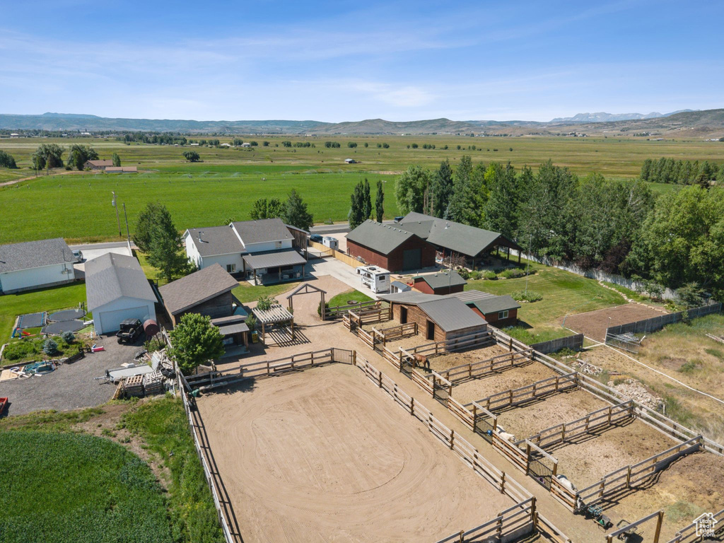 Aerial view of sparsely populated area featuring a mountain backdrop