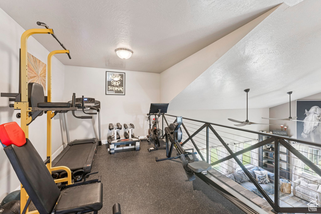 Workout area with a textured ceiling