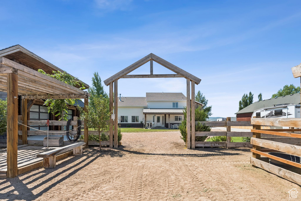 View of front of home featuring a pergola