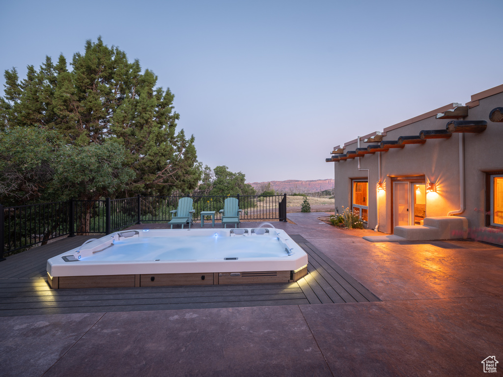 View of swimming pool with a deck