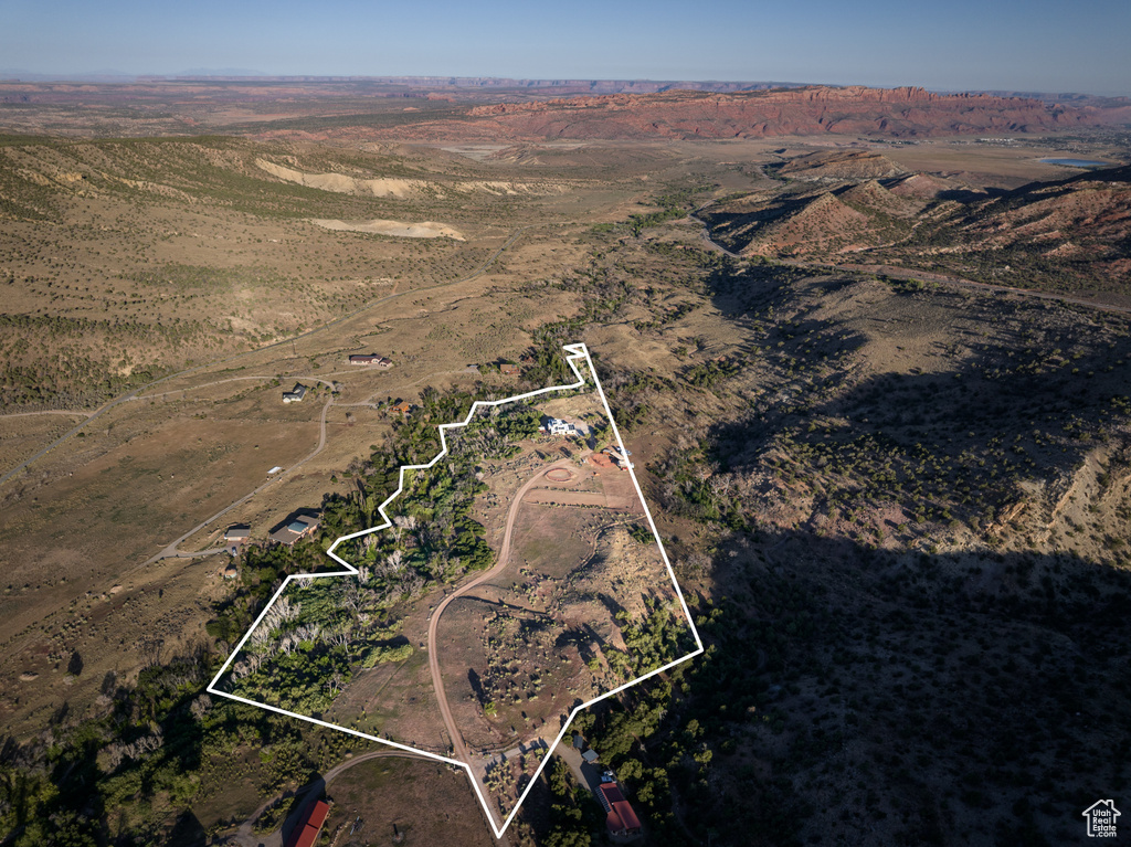 Aerial view of property\'s location with property parcel outlined and rural landscape