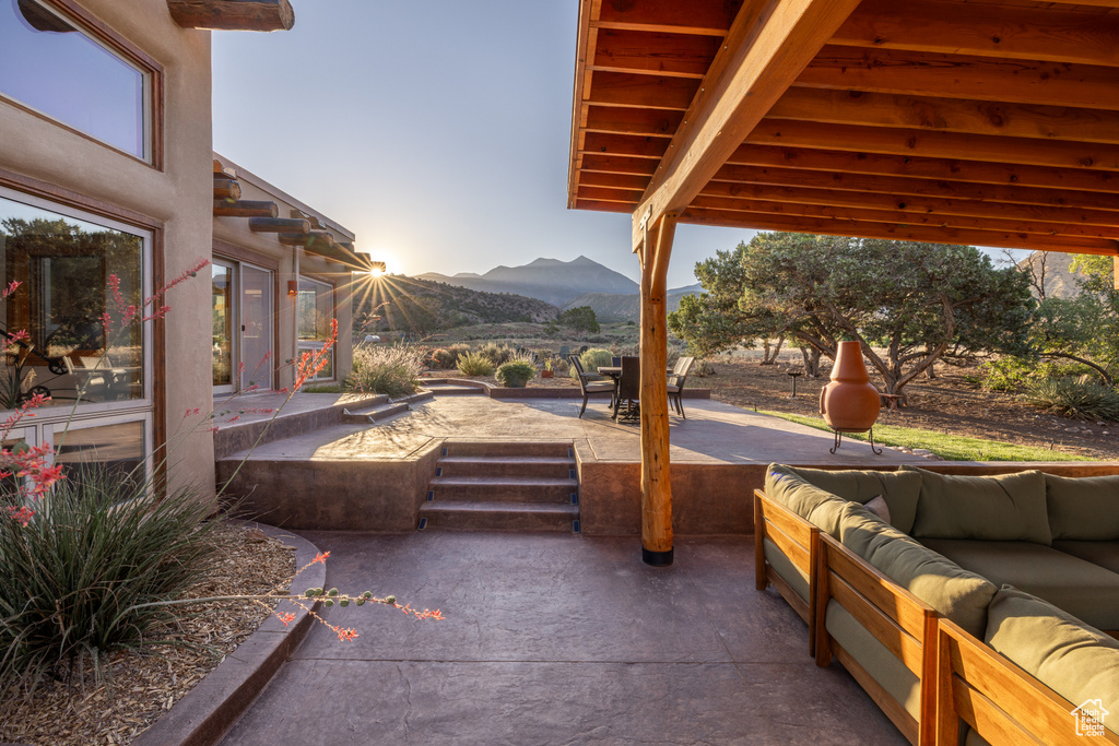 View of patio featuring a mountain view and outdoor lounge area