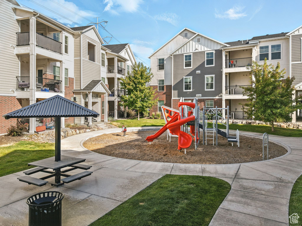 Community playground featuring a residential view