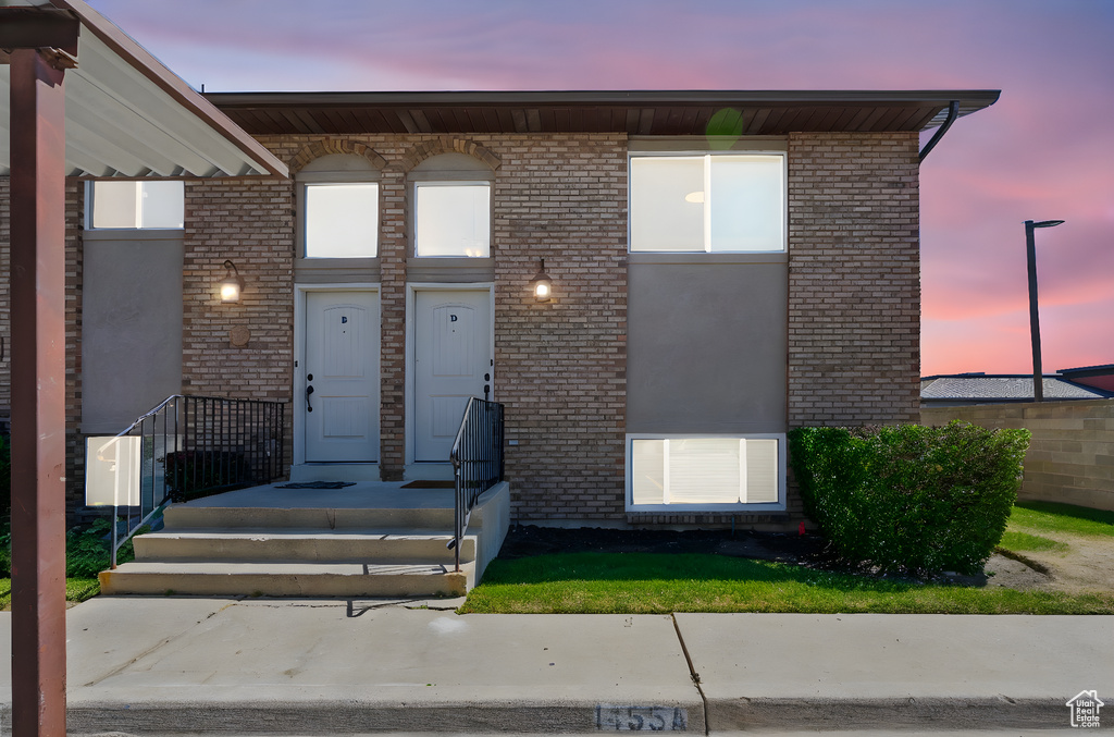 View of front of home with brick siding