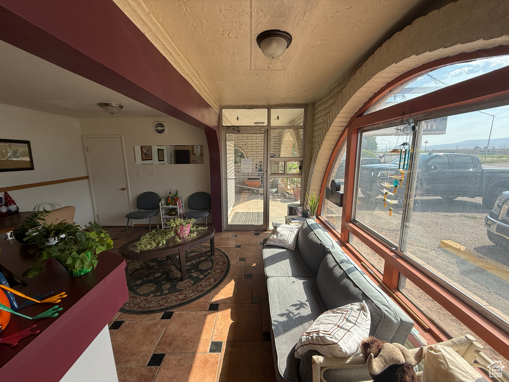 Sunroom with an outdoor hangout area