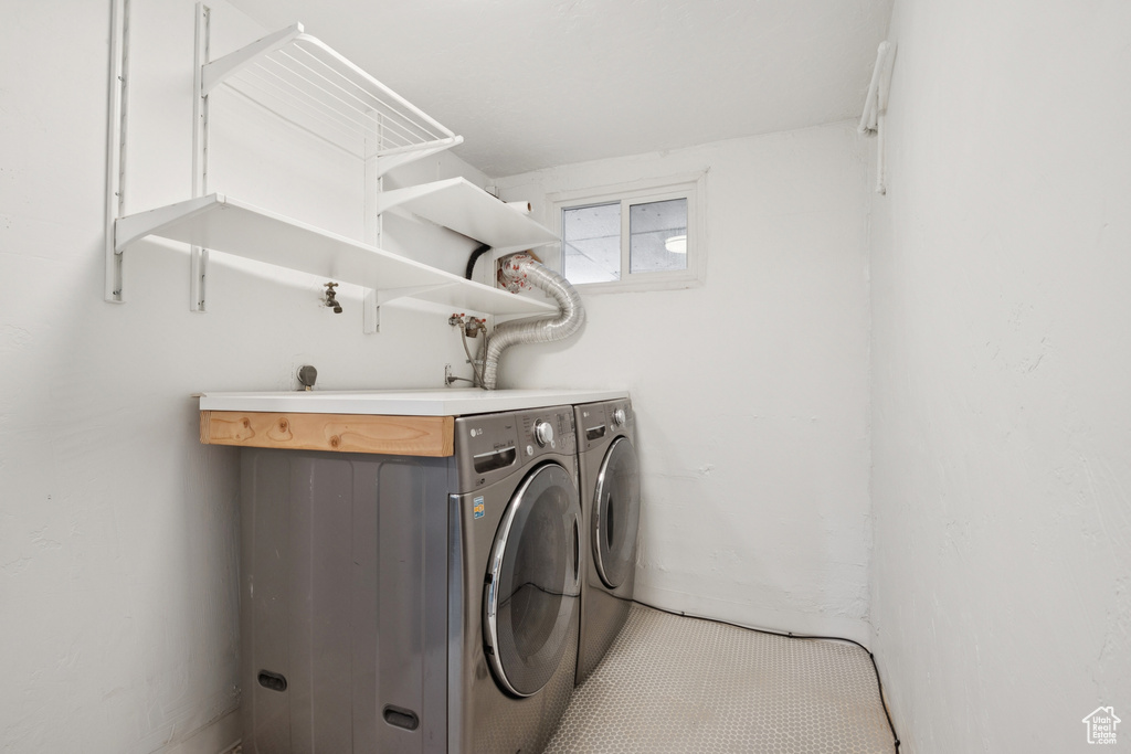 Laundry room featuring washing machine and dryer
