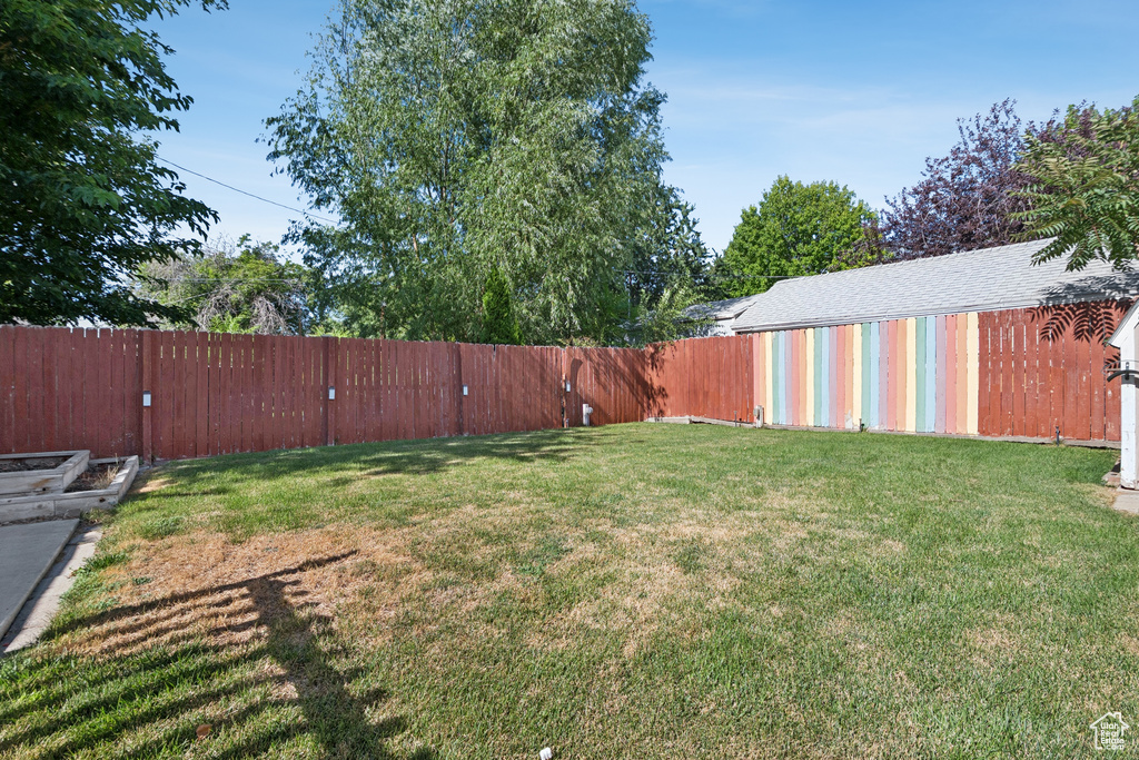 View of fenced backyard