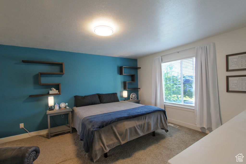 Bedroom with carpet floors