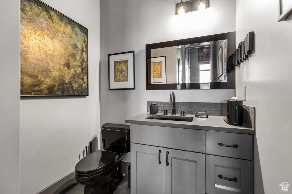 Bathroom with vanity and toilet