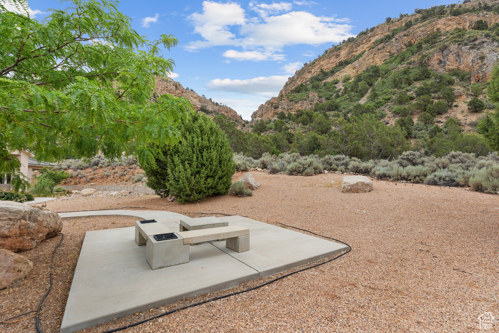 View of patio / terrace with a mountain view