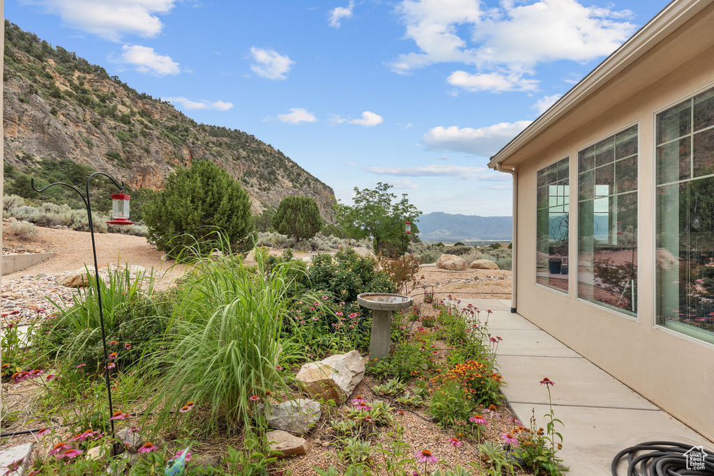 View of yard with a mountain view