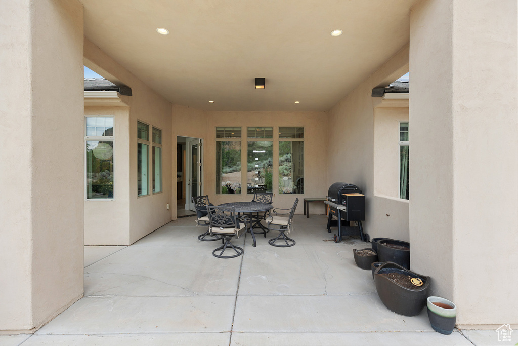 View of patio / terrace with outdoor dining area and a grill
