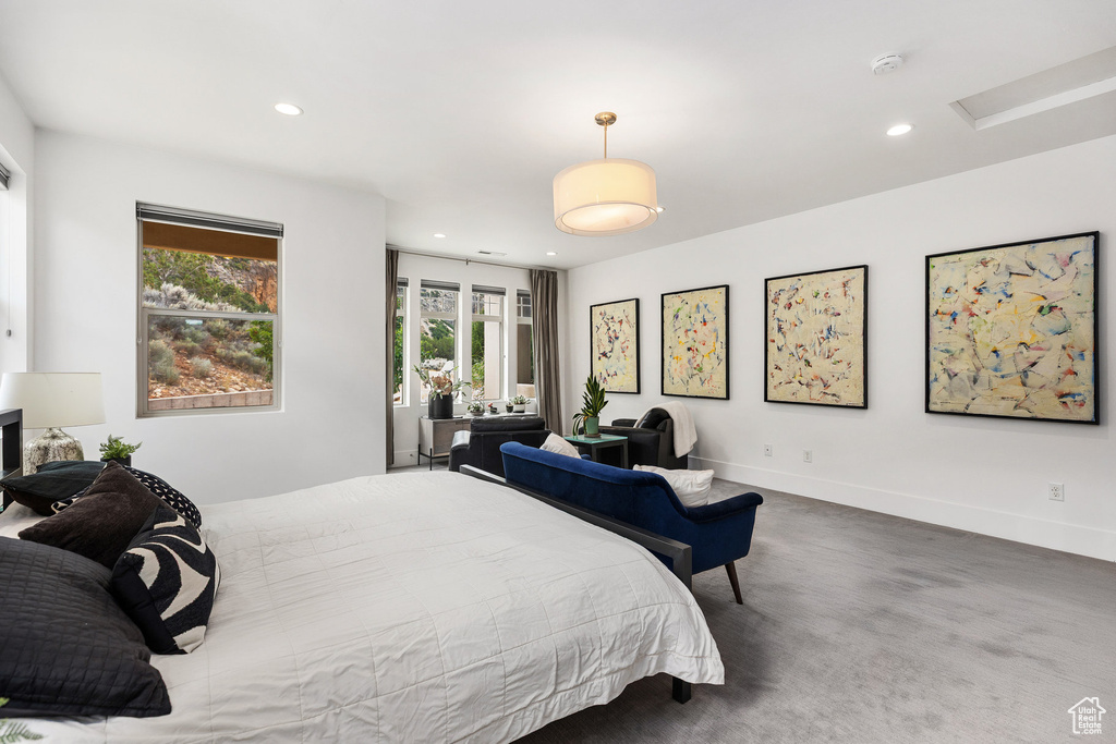 Bedroom featuring recessed lighting, attic access, and carpet flooring