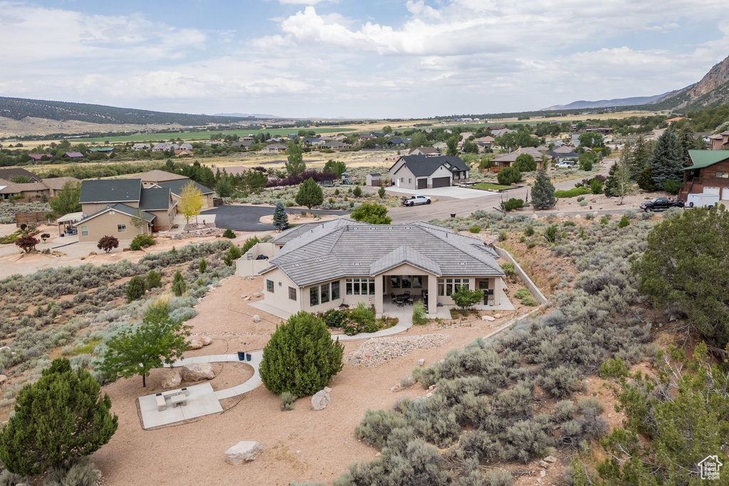 View of subject property with mountains