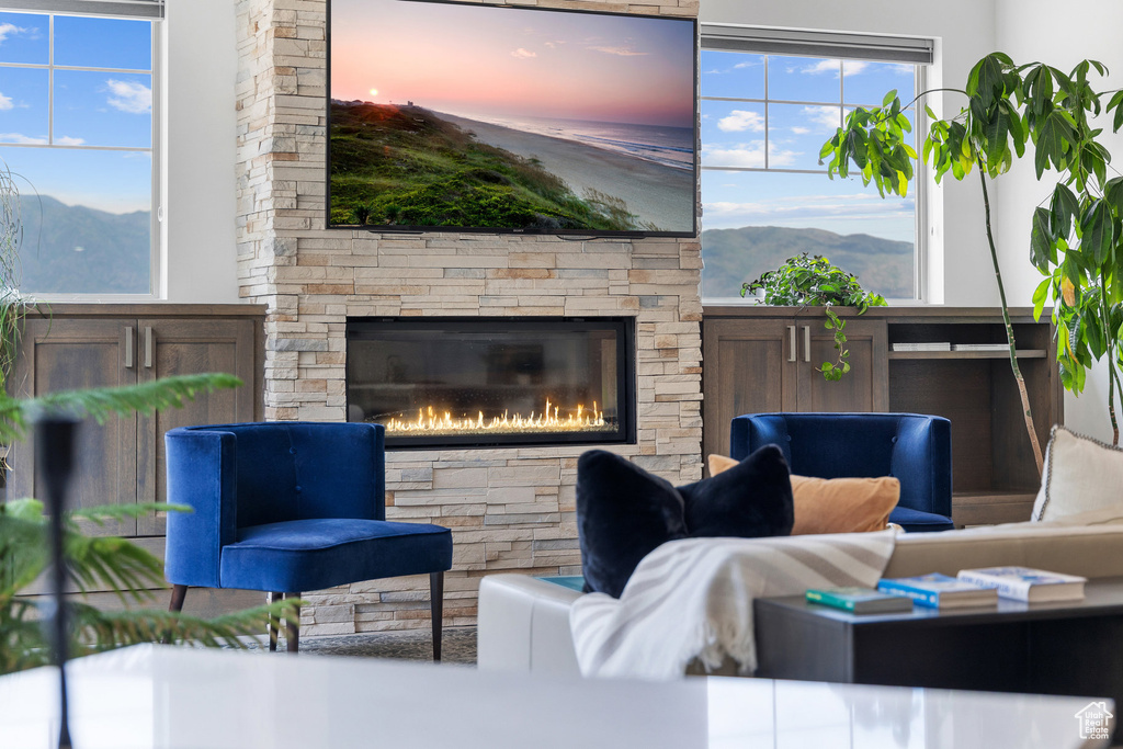 View of patio featuring an outdoor living space with a fireplace