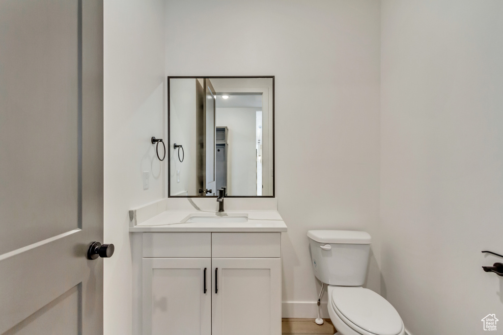 Bathroom featuring toilet and vanity