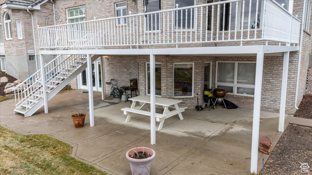 View of patio / terrace featuring stairs
