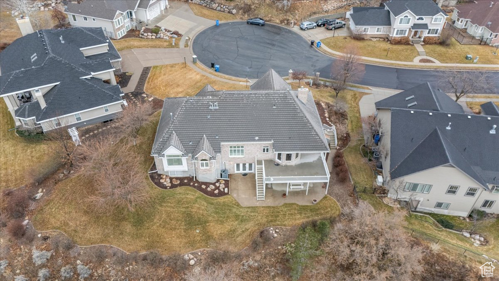 Aerial view of property's location with nearby suburban area