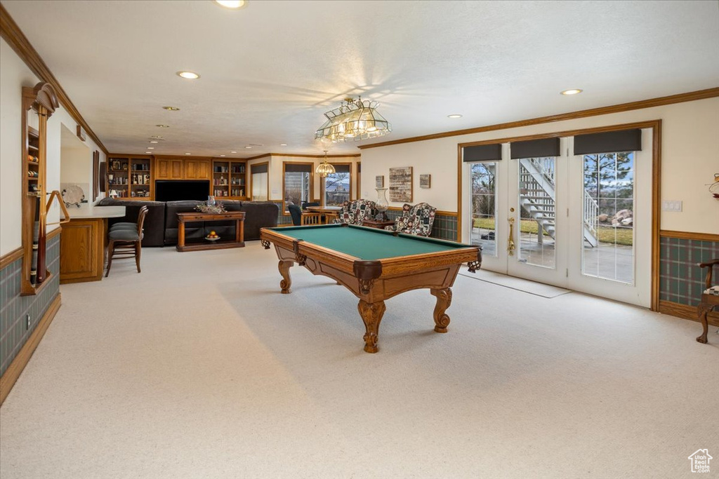 Recreation room with recessed lighting, ornamental molding, light colored carpet, and pool table