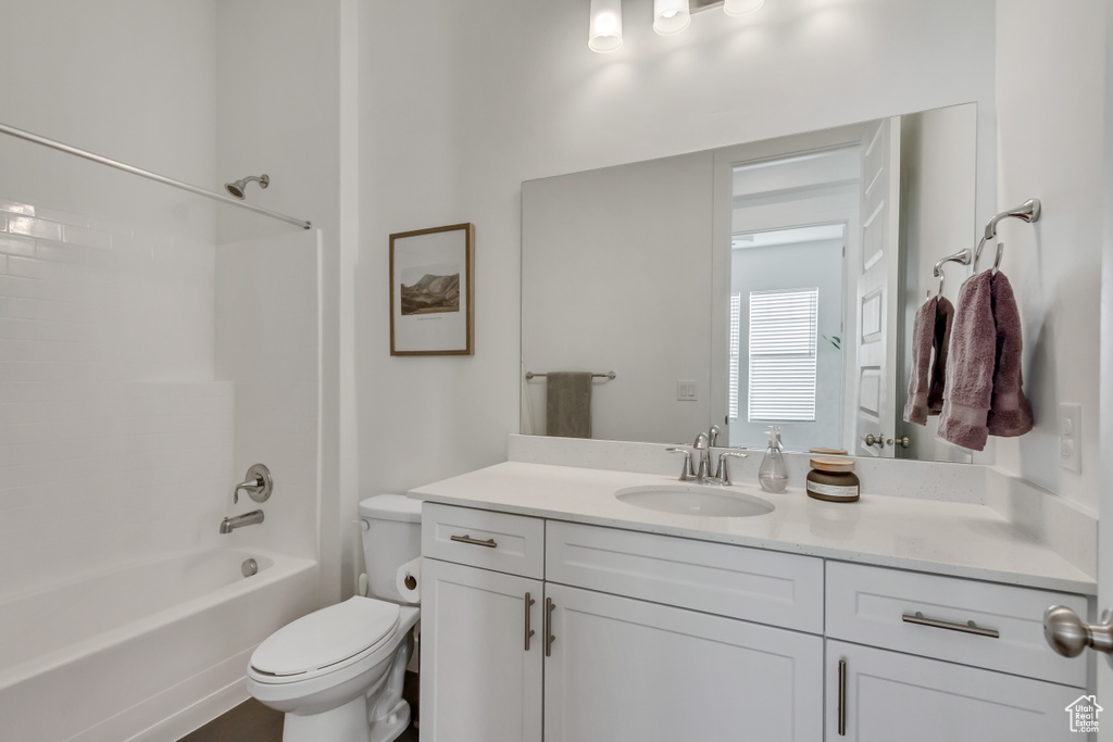Bathroom featuring vanity and tub / shower combination