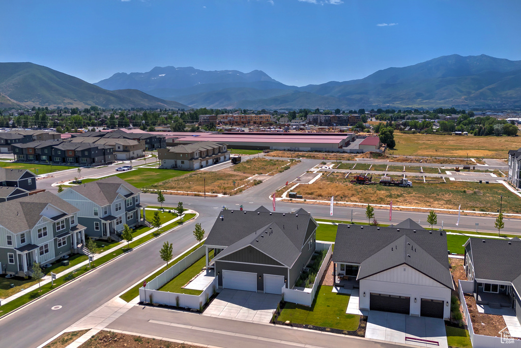 Aerial view of residential area featuring mountains