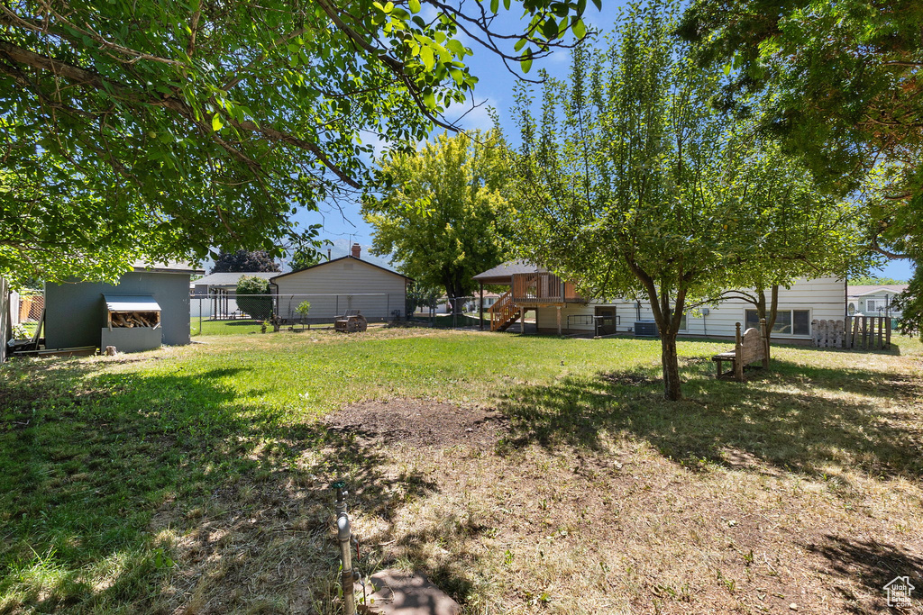View of fenced backyard