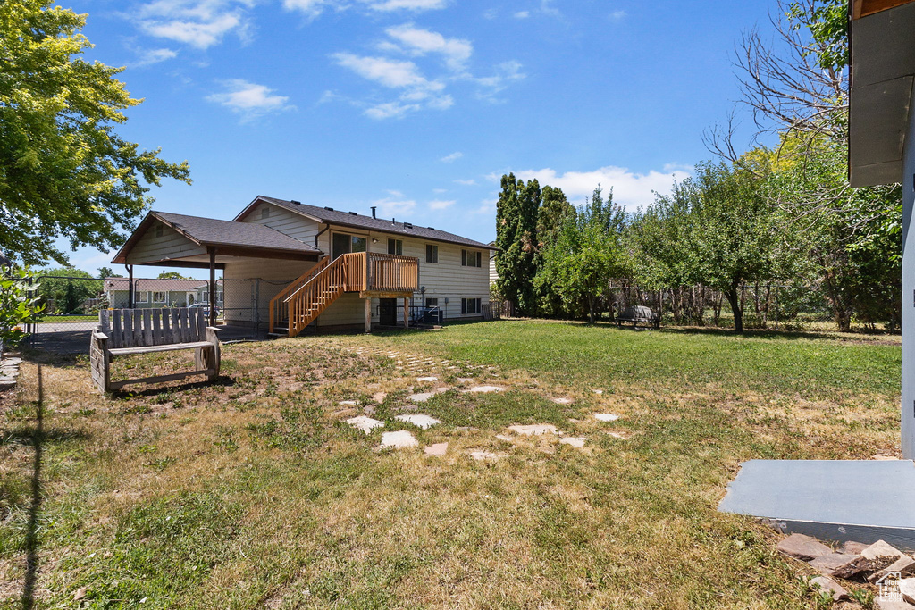 View of yard featuring stairway