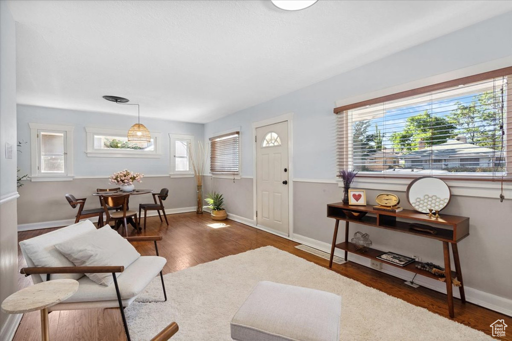 Living area with wood finished floors
