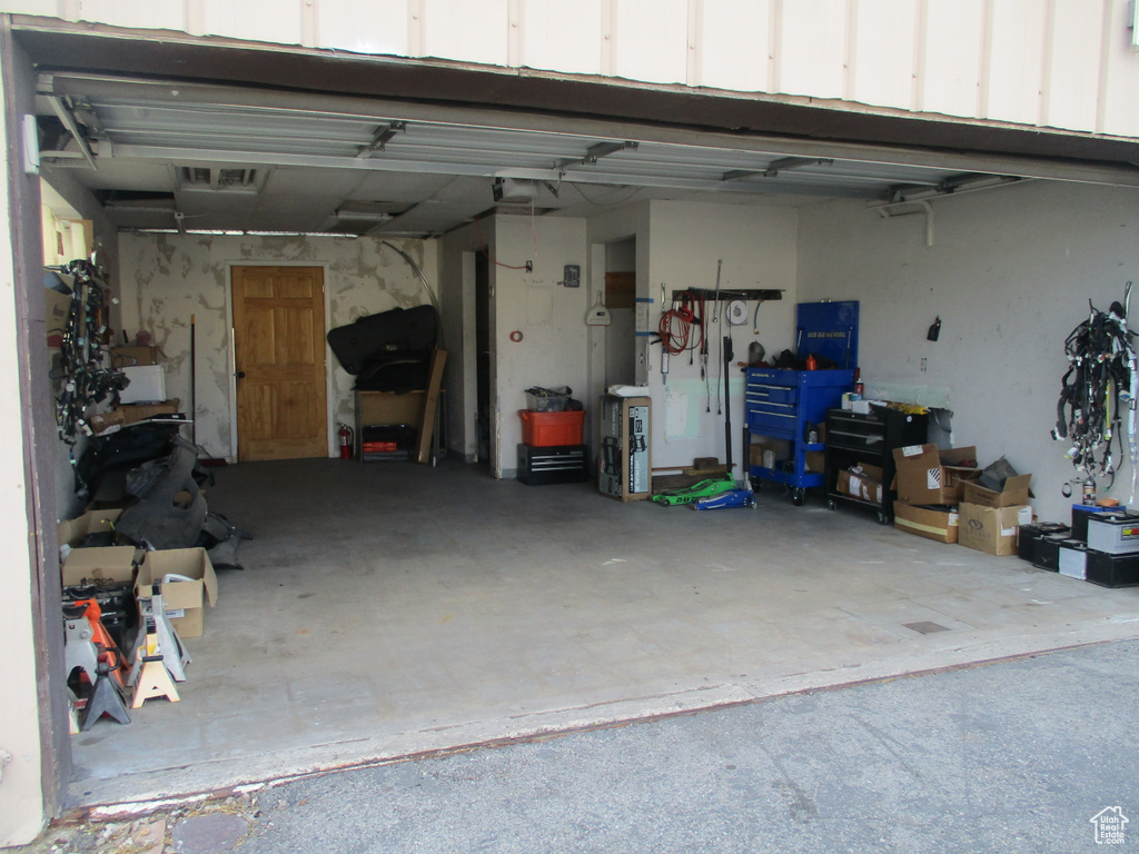 Garage featuring a garage door opener