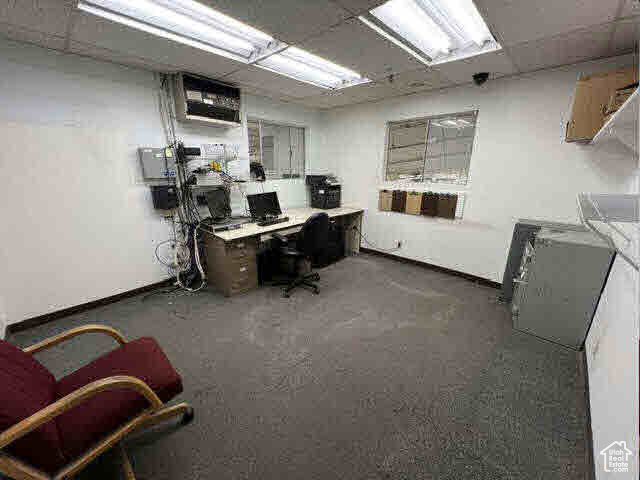 Office featuring a paneled ceiling