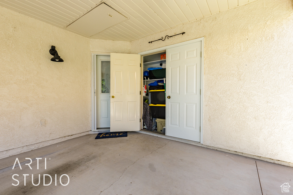 View of exterior entry featuring stucco siding