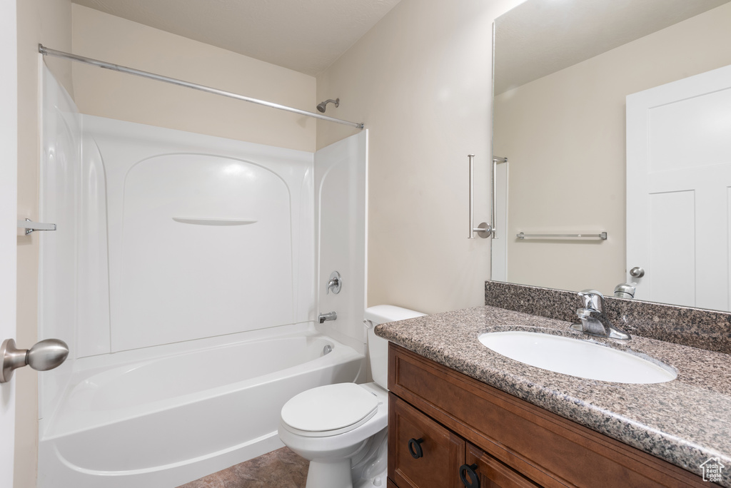 Full bathroom with vanity and bathing tub / shower combination