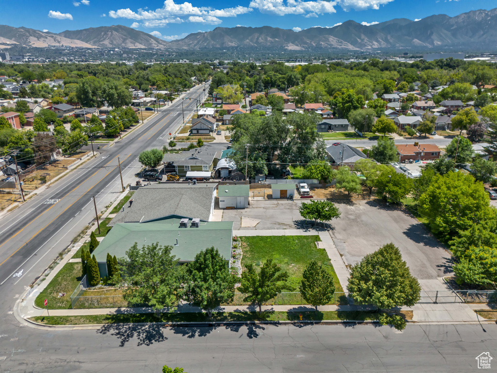 Aerial view of residential area featuring mountains