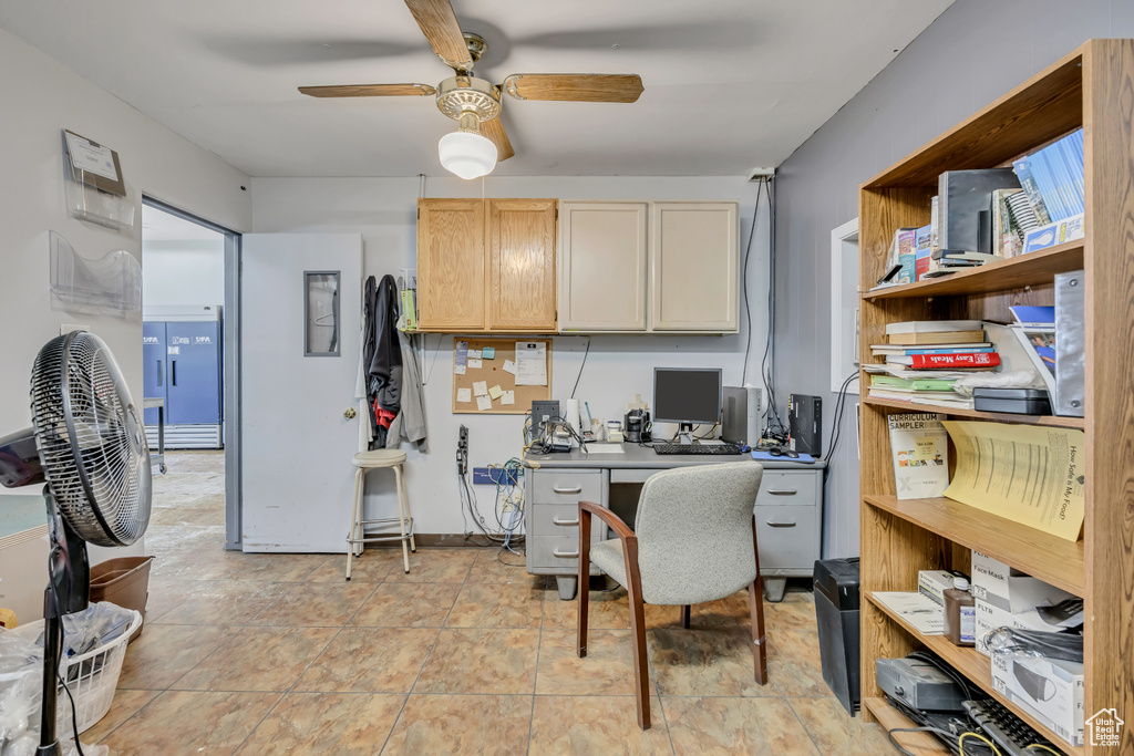 Office area featuring a ceiling fan