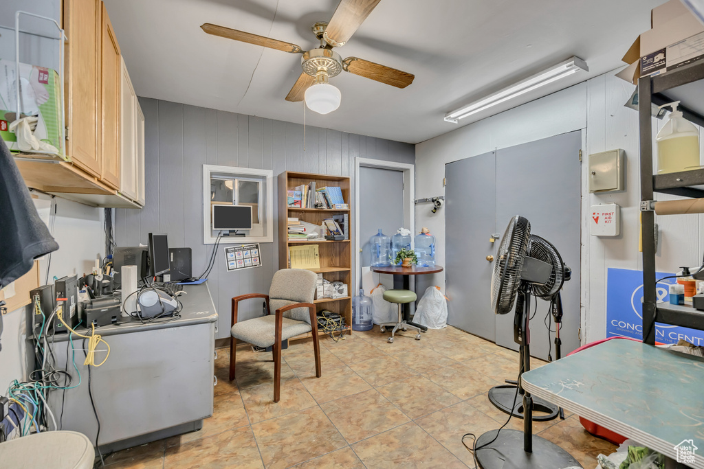 Office area featuring ceiling fan