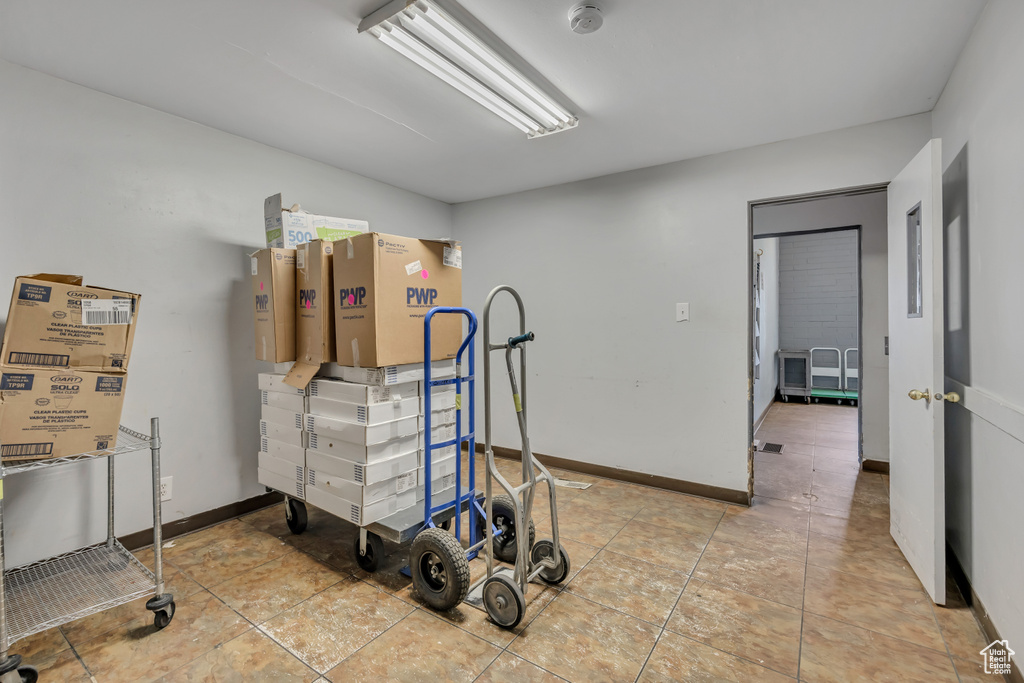 Bedroom featuring light tile patterned floors