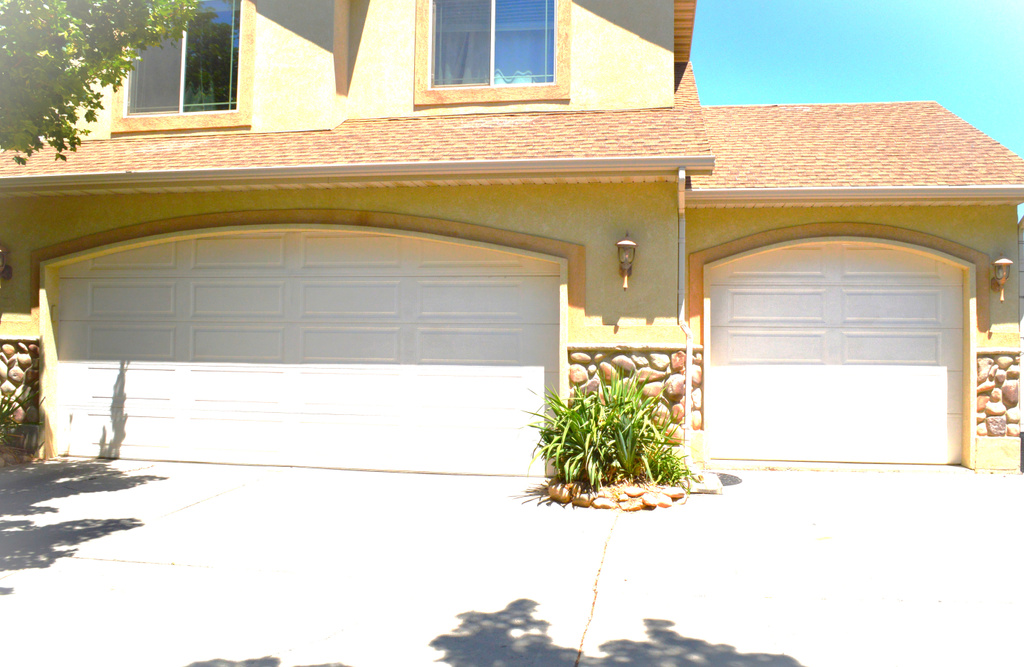 Garage featuring driveway