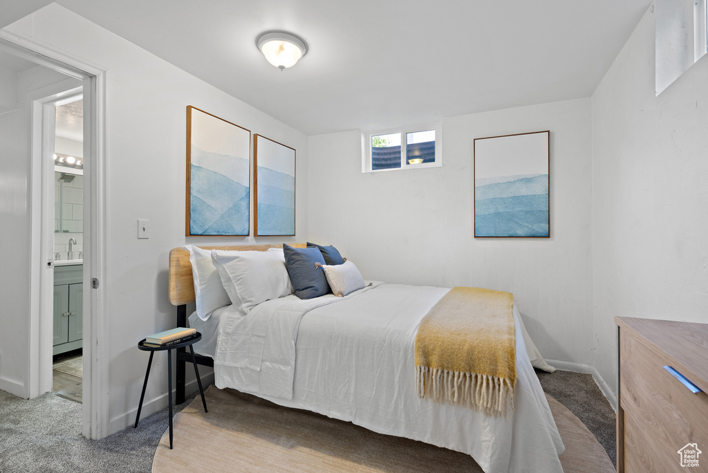 Bedroom with carpet and ensuite bath