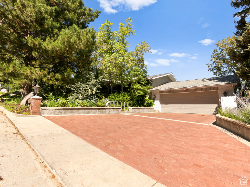 View of front of property featuring an attached garage