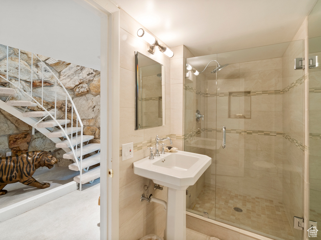 Bathroom featuring a shower stall