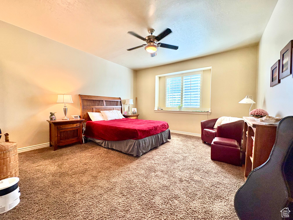 Bedroom with carpet floors and ceiling fan