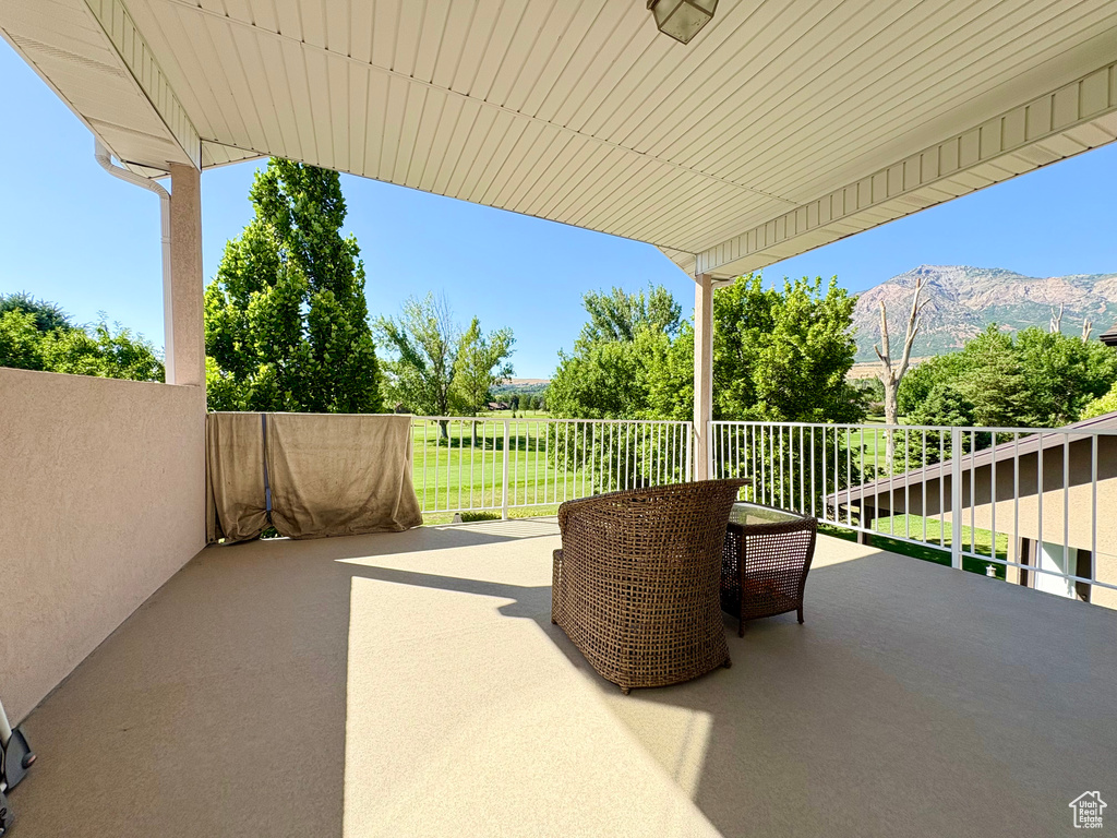 Patio / terrace featuring a mountain view