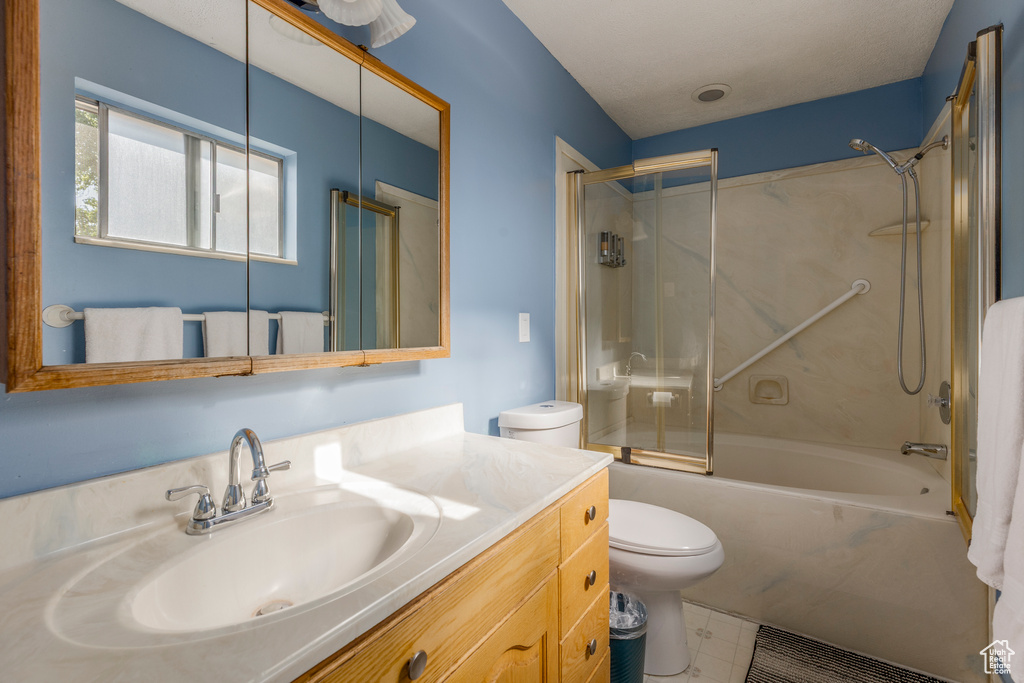 Full bathroom featuring shower / washtub combination and vanity